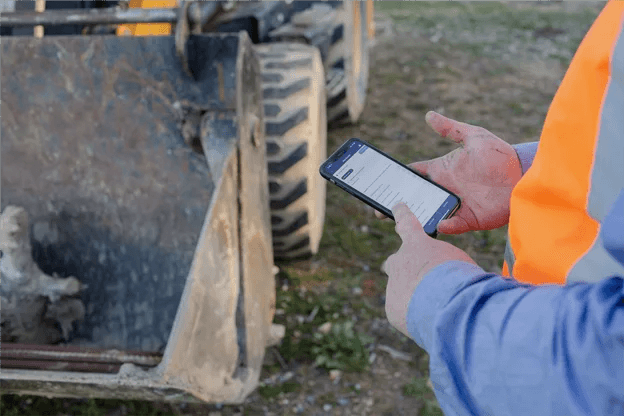 Construction and field teams using Record Time job scheduling software on site